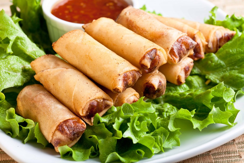 Lumpia, a Filipino spring roll, served on a plate.